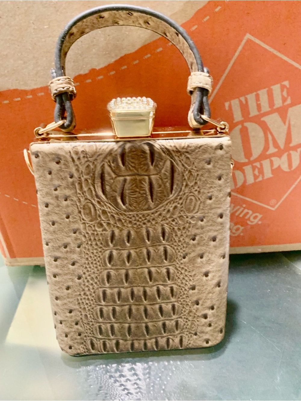Never used crock structured bag with jeweled botton to open /close it.